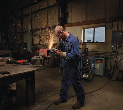 a welder not wearing a welding mask during work